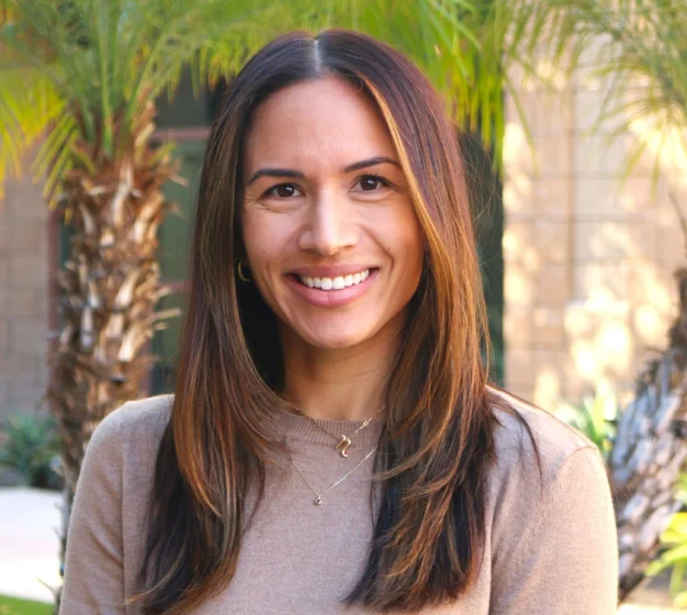 Dr. Erin Hong smiling in a professional portrait