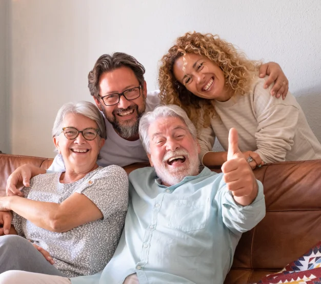 Family smiling together while enjoying time at home
