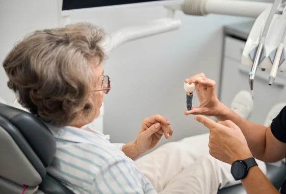 Dentist performing CT-guided dental implant placement